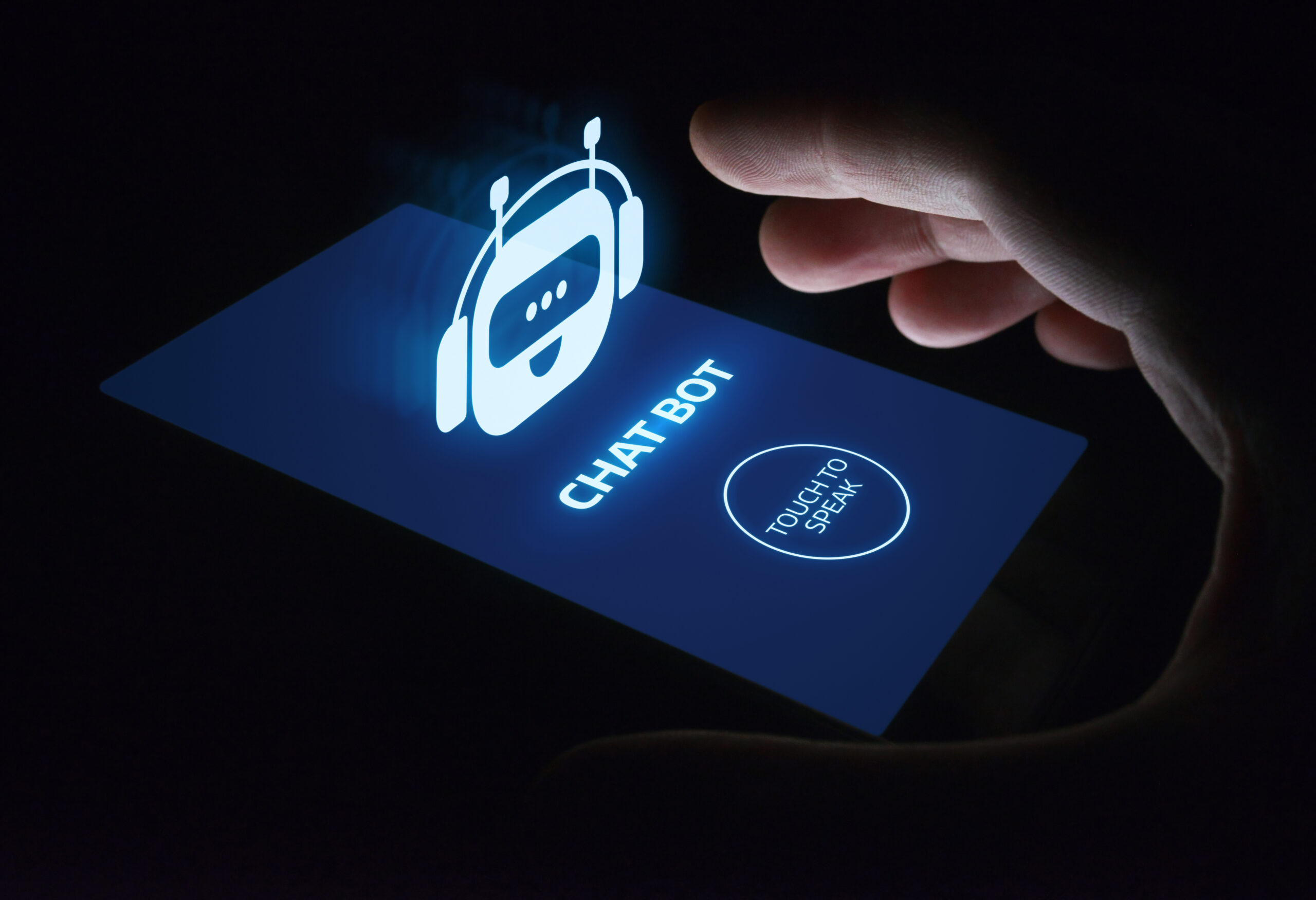 A glowing AI chatbot interface on a smartphone screen, with a user’s hand reaching towards the 'Touch to Speak' button, symbolising AI-powered virtual assistants in customer support.