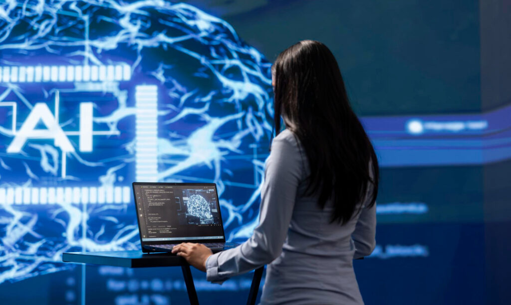 Consultant reviewing AI system architecture on a laptop with a neural network display in the background