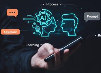 A person holding a smartphone with a glowing AI graphic showing two human profiles, icons for assistant, prompt, learning, process, and result — symbolizing AI consultancy and business applications in Singapore.